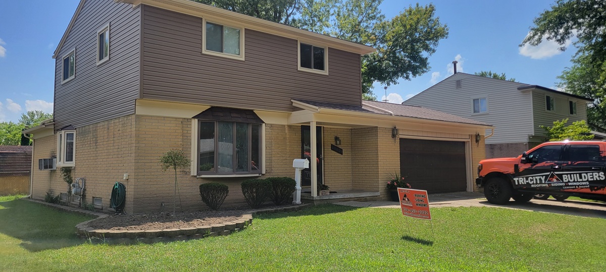 Vinyl siding and trim detail in Redford Township